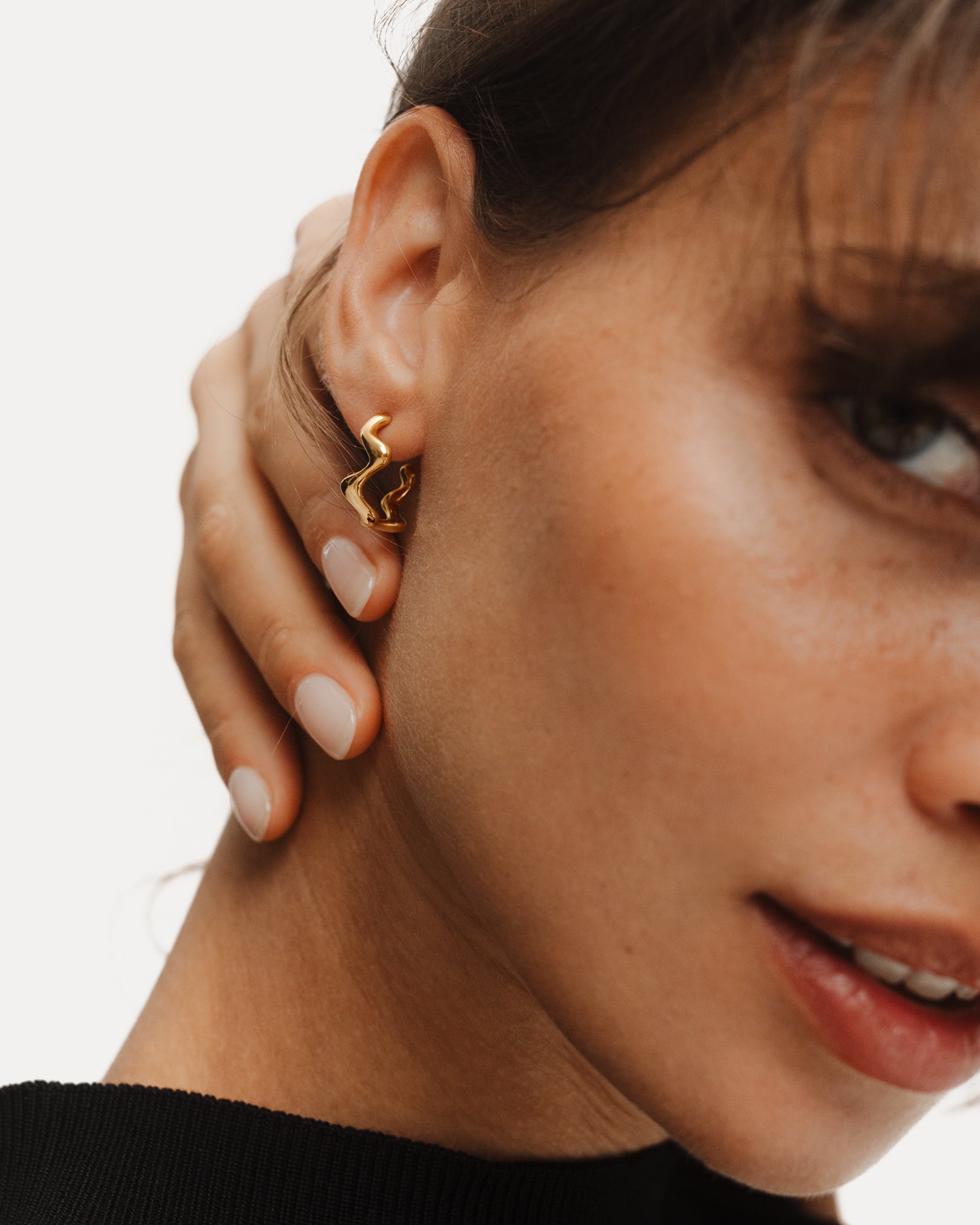 Poise Wave Hoop Earrings Small, recycled 18k Gold Vermeil, shown on ear - NATALIE GRASSI
