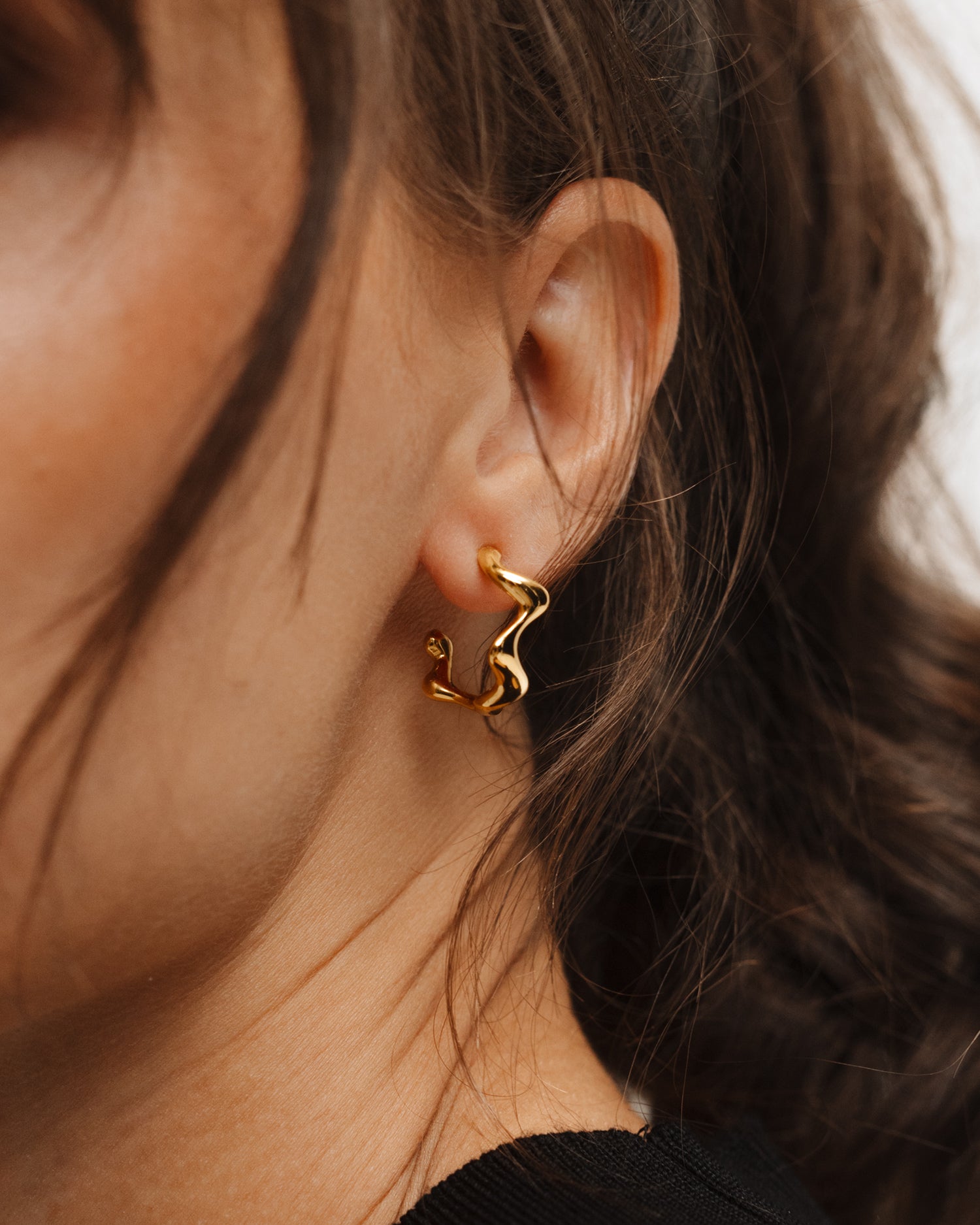 Poise Wave Hoop Earrings Small, recycled 18k Gold Vermeil, shown on ear - NATALIE GRASSI