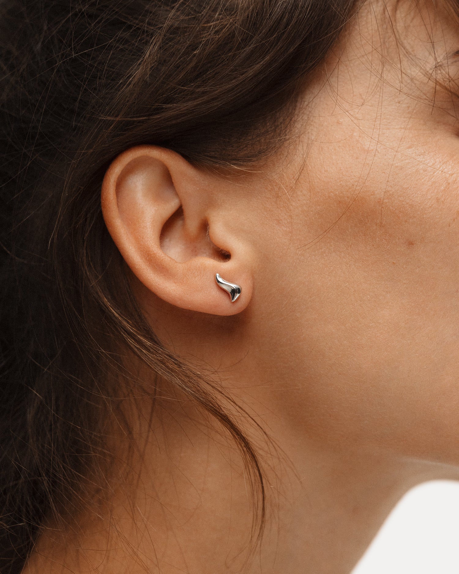 Poise Flow Stud Earrings, recycled Sterling Silver, shown on model - NATALIE GRASSI