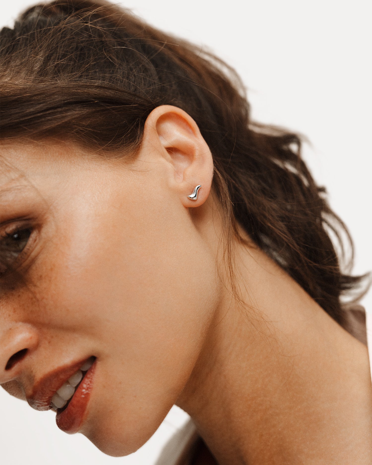 Poise Flow Stud Earrings, recycled Sterling Silver, shown on model - NATALIE GRASSI