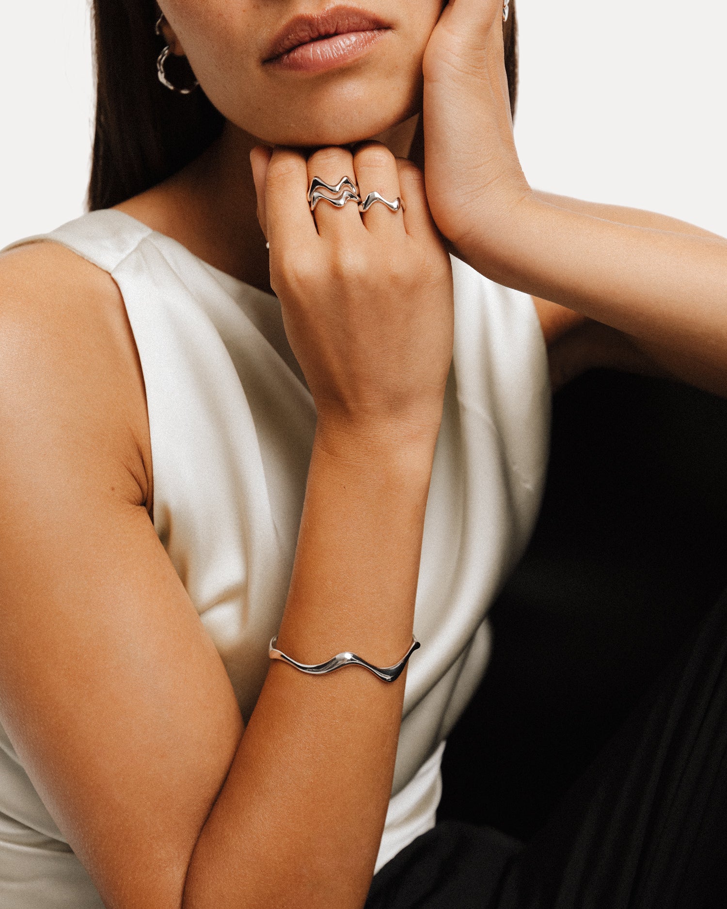 Poise Wave Cuff Bangle, recycled Sterling Silver, styled with silver jewelry - NATALIE GRASSI