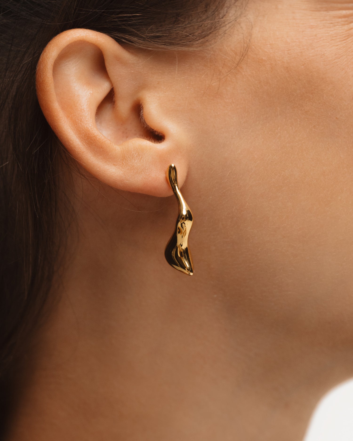 Poise Molten Drop Earrings, recycled 18k Gold Vermeil, shown on model - VEYIA Berlin